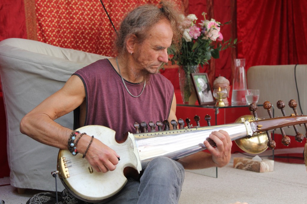 A man playing a string instrument.